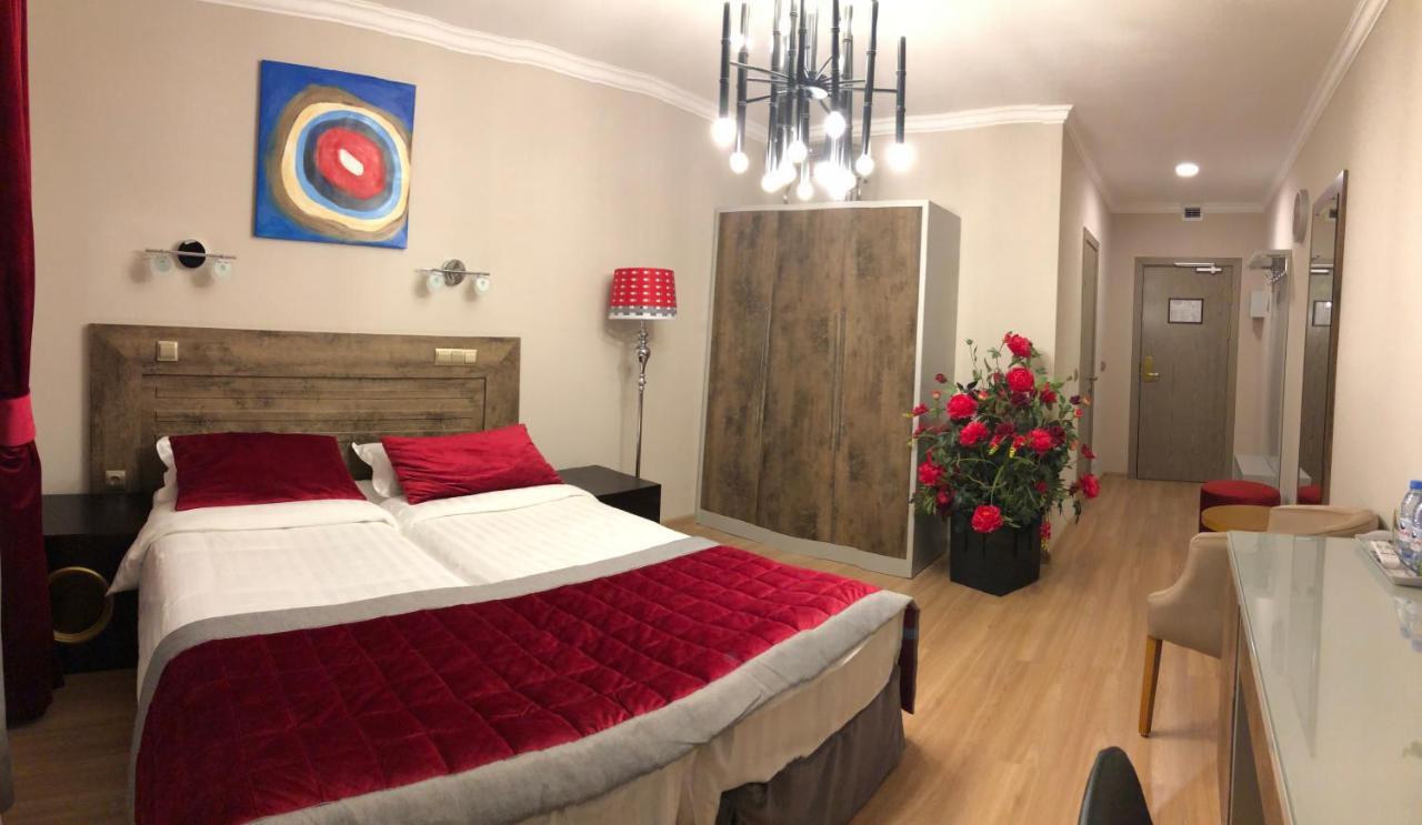 Grace Point Hotel 阿斯坦纳 客房 照片