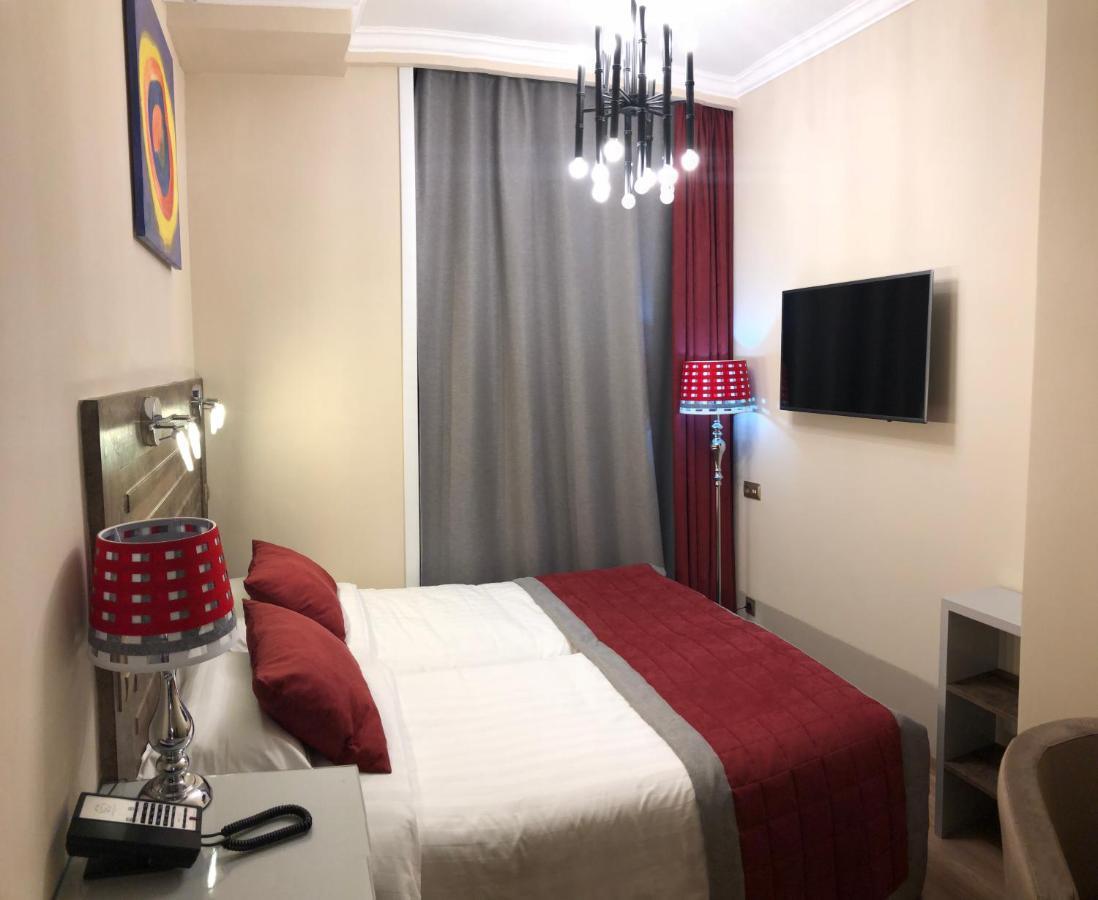 Grace Point Hotel 阿斯坦纳 客房 照片